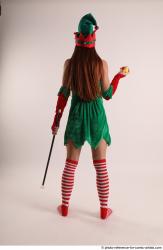 Veronika Elf Pose With Apple